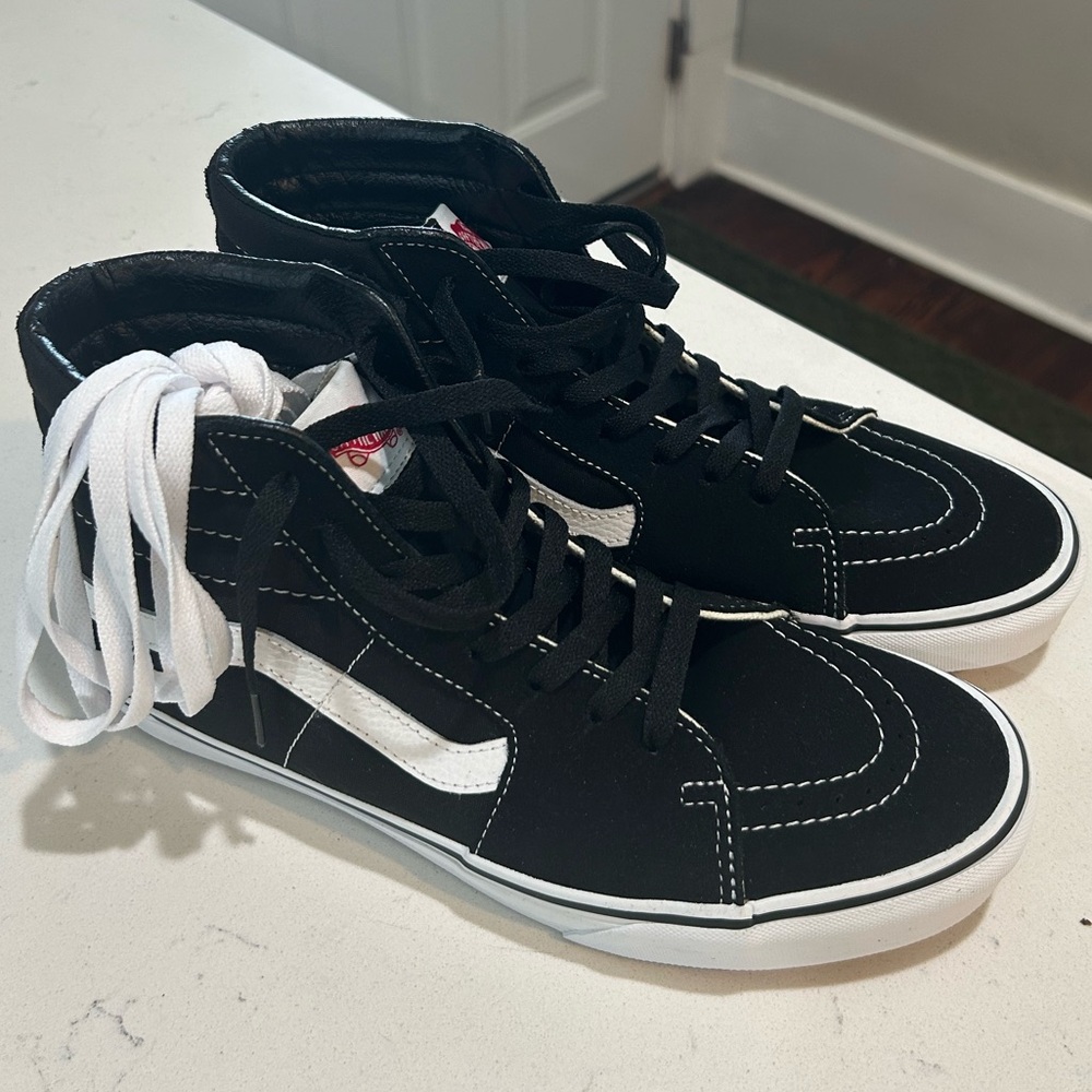 Vans Sk8-hi. Black and white. Size: 10.0

New without Box.